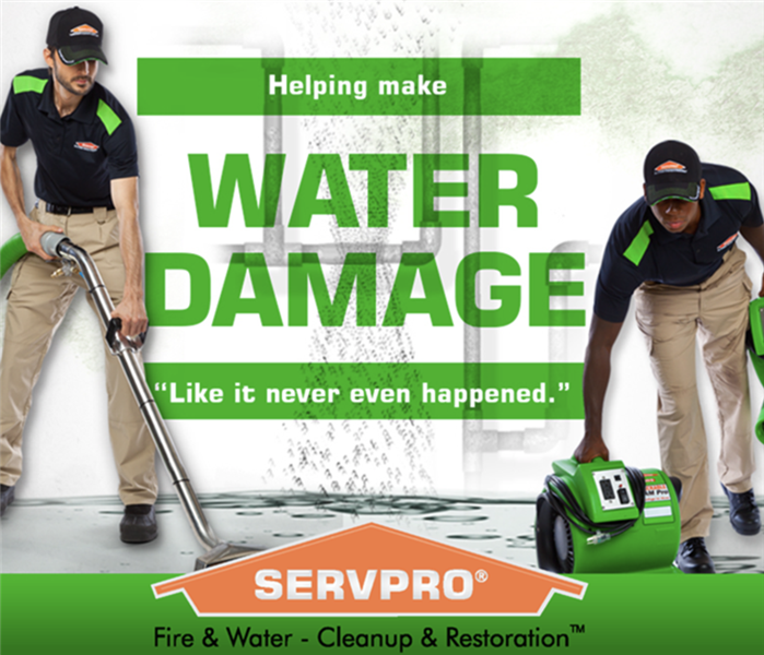 SERVPRO Water Restoration advertisement - two men extracting water